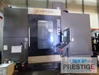 Hankook #VTC-125E, 49" table, 63" swing, 55" UR, 8.6" x 8.6"ram, C-Axis, milling, 24 ATC, Fanuc 32iA CNC - Image 1
