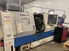 Daewoo Doosan #Puma-240, CNC Lathe, 10" Chuck, 4500 RPM, 21.7" Swing, Chip Conveyor & Tailstock, 2005 - Image 4