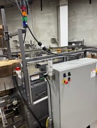Pearson Packaging Systems, complete packaging system, made up of box erector, robot, palletizer & unscrambler - Image 1