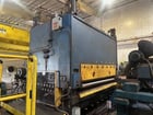72" x .25" Bradbury, 4-Hi, 11-roll automatic selective hydraulic pull thru leveler, 500 FPM, L to R, 2011 - Image 1