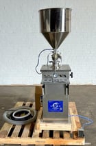 Yangzhou Yuxiang #GZJ, Vertical Volumetric Filler, 20-40 BPM, 100-1000ml, Stainless Steel, hopper, pedal - Image 1