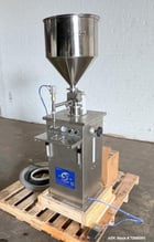 Yangzhou Yuxiang #GZJ, Vertical Volumetric Filler, 20-40 BPM, 100-1000ml, Stainless Steel, hopper, pedal - Image 2