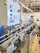Severn Trent #UAT, Overflow Gravity Filler, 8-Head, 1 Gallon Bottles, Labeler Included, 220 V., 2002 - Image 2