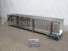 24" wide x 15' long, Kamflex #810, Stainless Steel live bottom accumulation trough, .75 HP drive, 30" high - Image 1