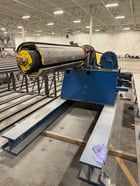 20000 lb. McKay, uncoiler, 22" ID, 84" outside dimensions, 67" width, 4 leaf mandrel, powered - Image 1
