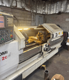Romi #M20, CNC Lathe, 20" swing, 60" machining length, 12" chuck, 3" bar, 15 HP, 20.47" turning diameter - Image 1