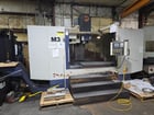Takumi #V20, vertical machining center, 70.8" X, 35.4" Y, 29.5" Z, 4500 RPM, 16 automatic tool changer, CAT - Image 1