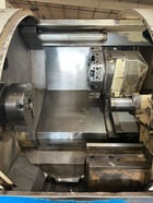 Okuma #Crown-769S-L1420/650, CNC turning center, 28.4" swing, 12" chuck, 3-jaw, 2.9" bar, 14.17" dia., 25.59" - Image 6