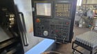Daewoo Doosan #Puma-300LC, CNC lathe, Fanuc 21iTB, 23.2" swing, 50.4" centers, 12" chuck, 4" bar, 2007 - Image 6