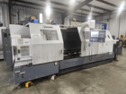 Okuma #LB-35II, CNC lathe, 27" swing, 20" chuck, 6" bar, 118" centers, 40 HP, OSP-P200L, tailstock - Image 1
