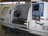 Image for Modern #TNC-670X2000-6, Tech type, hollow spindle, 26" swing, 80" between centers, 6-1/4" spindle bore, #5MT, 11-1100 RPM, new