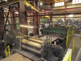 Image for 60" x .375" Seco slitting line, 50000 lb., 2 speed gearbox 200-500 FPM, L type entry coil car, uncoiler, 5-roll coil breaker, entry crop shear, slitting head, 2 scrap winders, recopiler, 3-arm exit turnstile