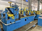 Image for 10" x .2" Cauffiel edging line, L to R, coil lift, uncoiler, peeler/holddown unit