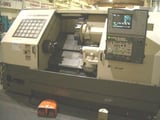 Image for Mitsubishi #M-TC10B, Meldas 520, 23.6" swing, 12" chuck, chip conveyor, 41.2" centers, 10.2" turn diameter, 1999