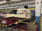 Image for 33 Ton, Strippit #1250MH, Fanuc OP, 50" x 80", 42 station, 4 automatic index, conveyor, 1995