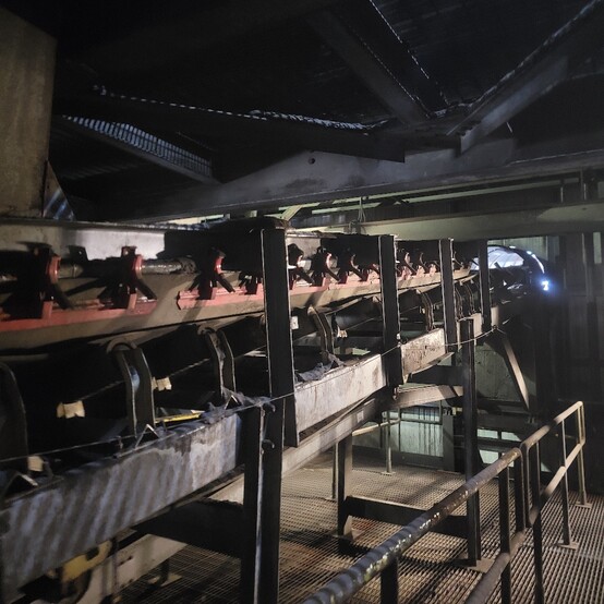 30" wide x 85' long, Channel Conveyor, 29.5" tail pulley take-up, 35° idlers, tail-end skirting, electric
