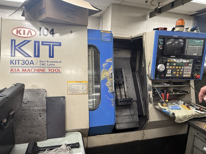 Kia #KIT30A, CNC lathe, Yasnac control, 18.9" swing, 6.69" swing over cross slide, 6" chuck, 1.5" bar, 5C