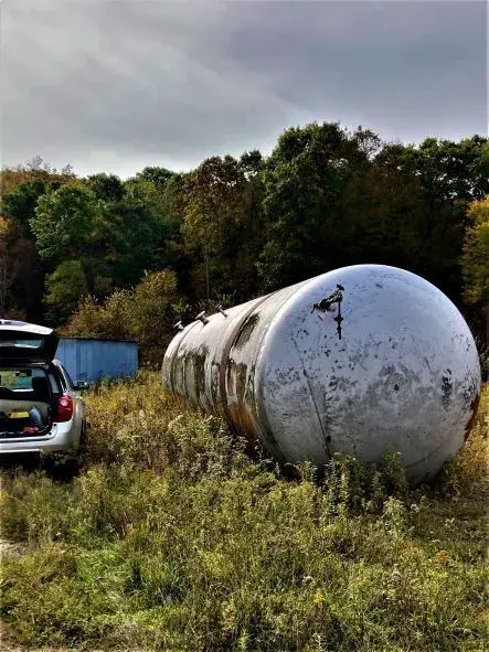 12,000 gallon 304 stainless steel horizontal tank, 100 psi, 8'10" diameter x 27' straight wall, curved ends