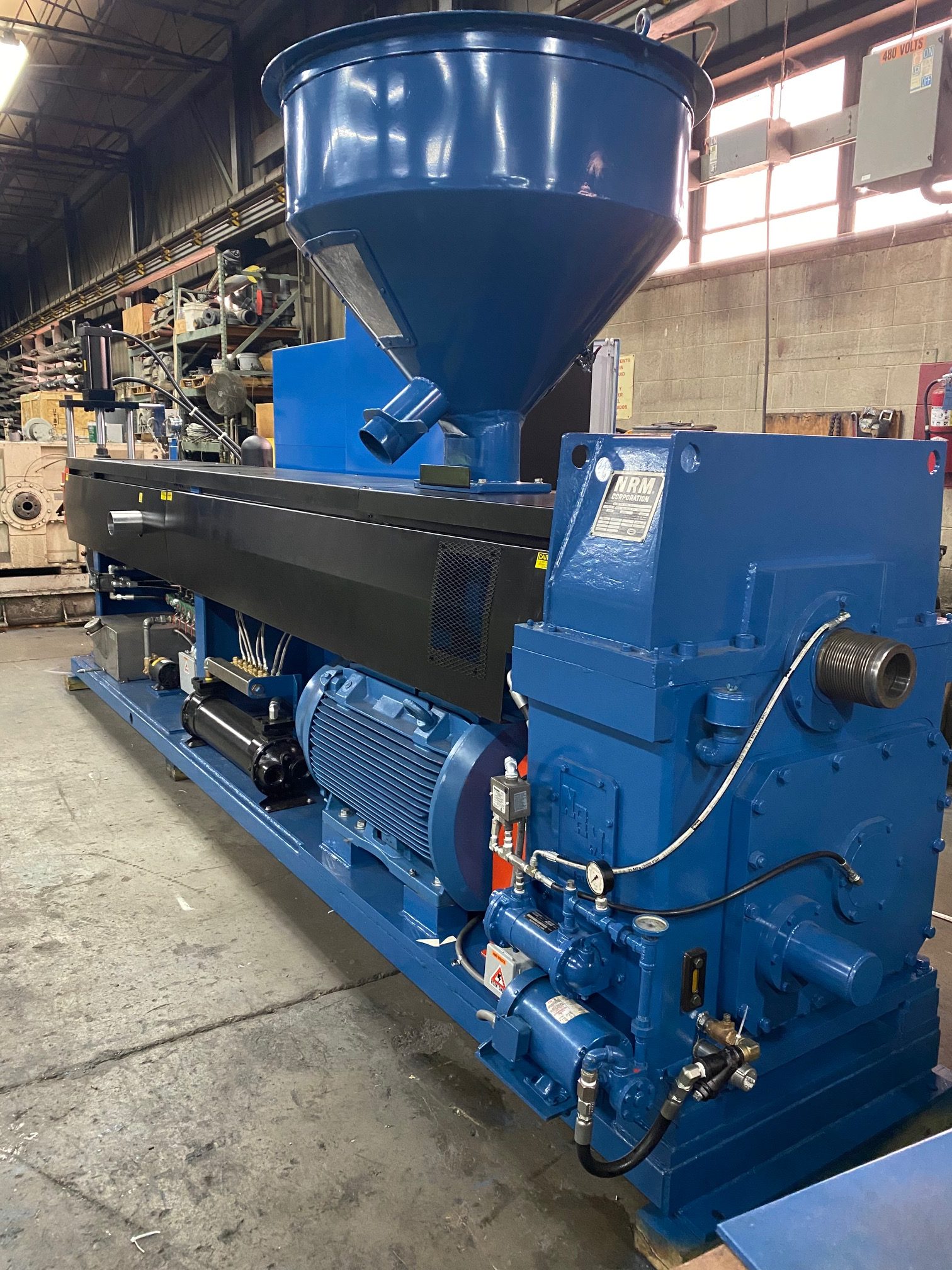 6" NRM, extruder, 30:1 L/D, vented, air cooled, 8 zone barrel, new 400 HP WEG AC motor & drive, 12 zone