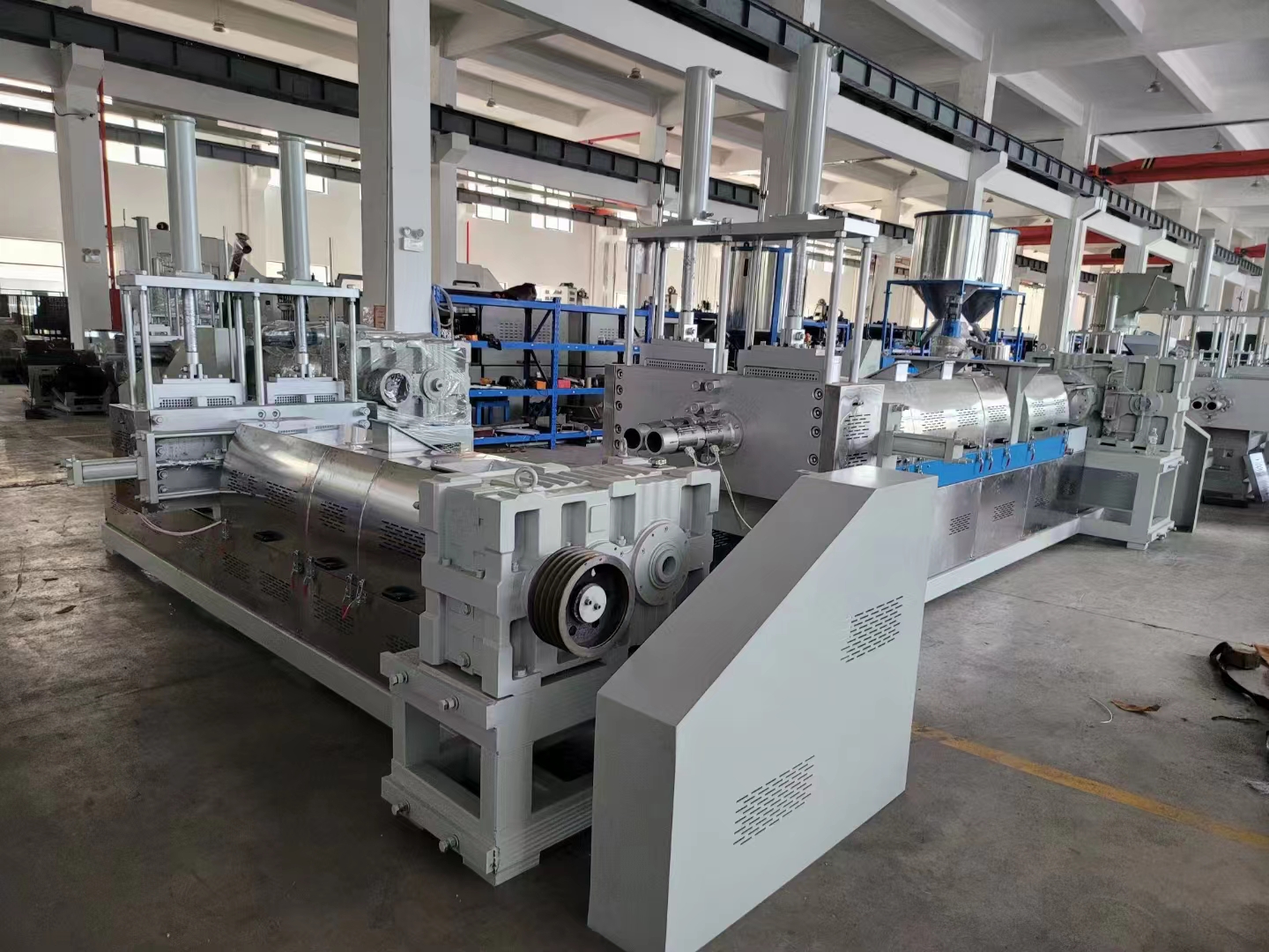 American Tuff Stock, dual single screw recycling extrusion line, washed PP/PE film, force feeder, pelletizer