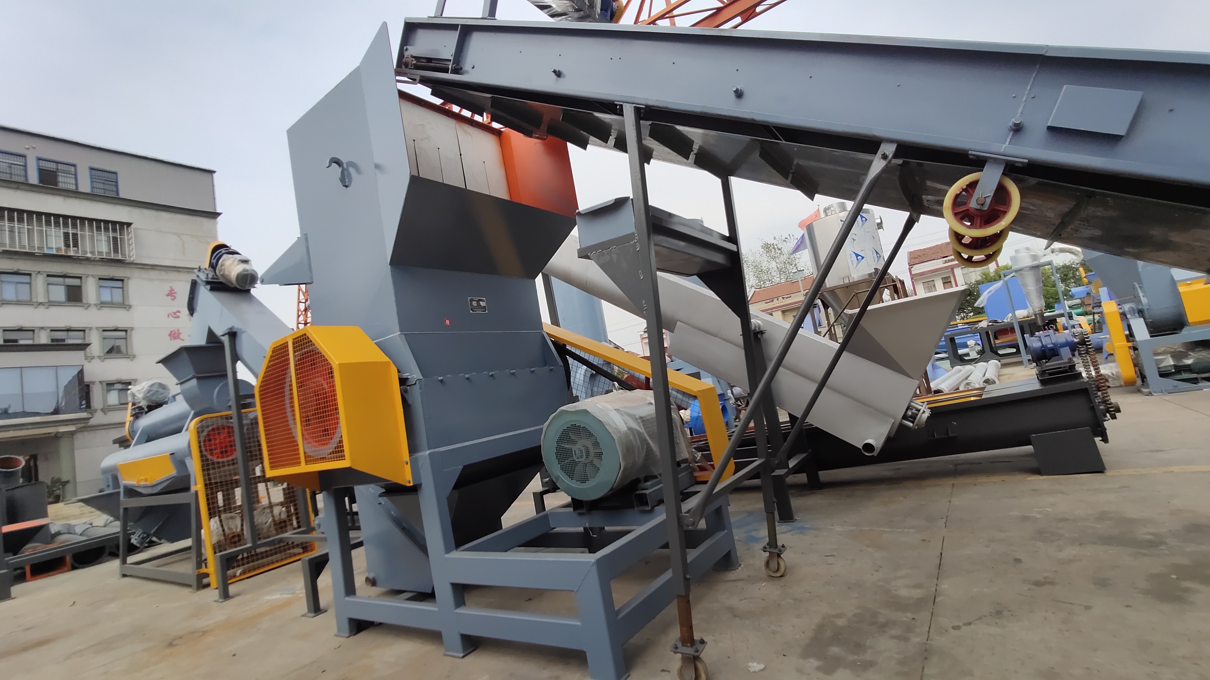 American Tuff Stock, plastic crusher w/ incline conveyor, NEW