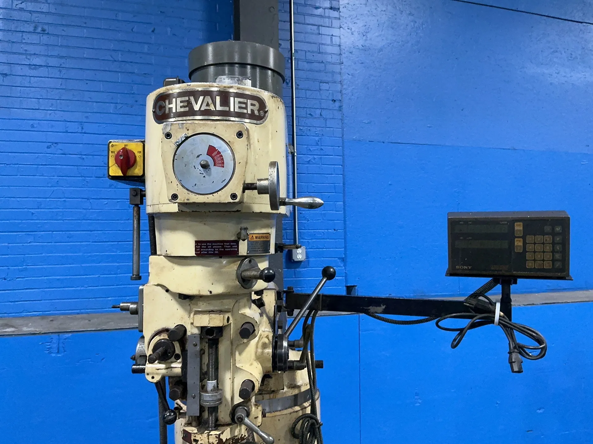 Falcon Chevalier #FM-3VS, vertical mill, 9" x 42", Sony Millman digital read out, 3 HP, 1720 RPM, 230/460 V.