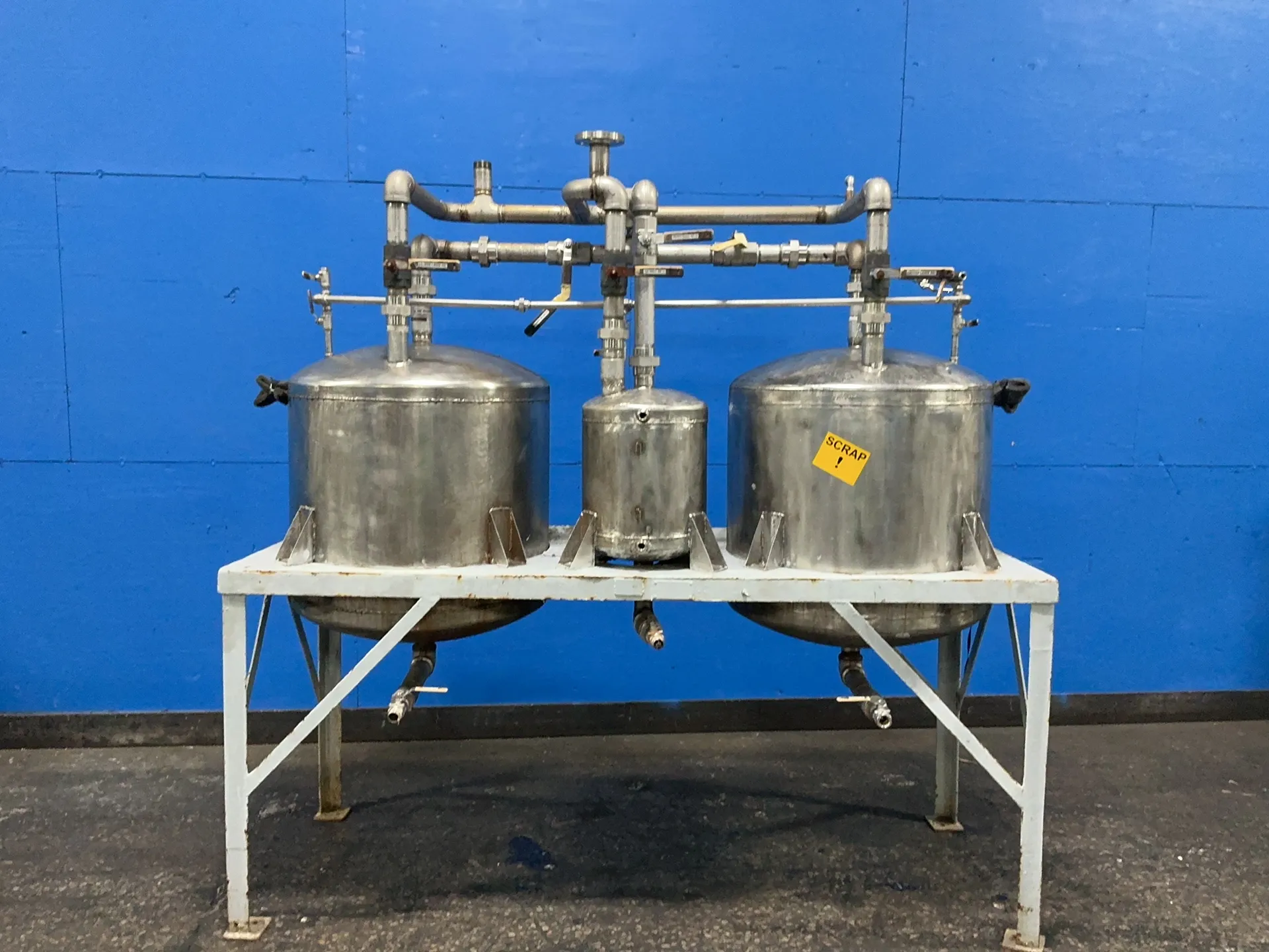 Stainless Steel still, 3 tanks, (1) 10 gallon, (2) 85 gallon