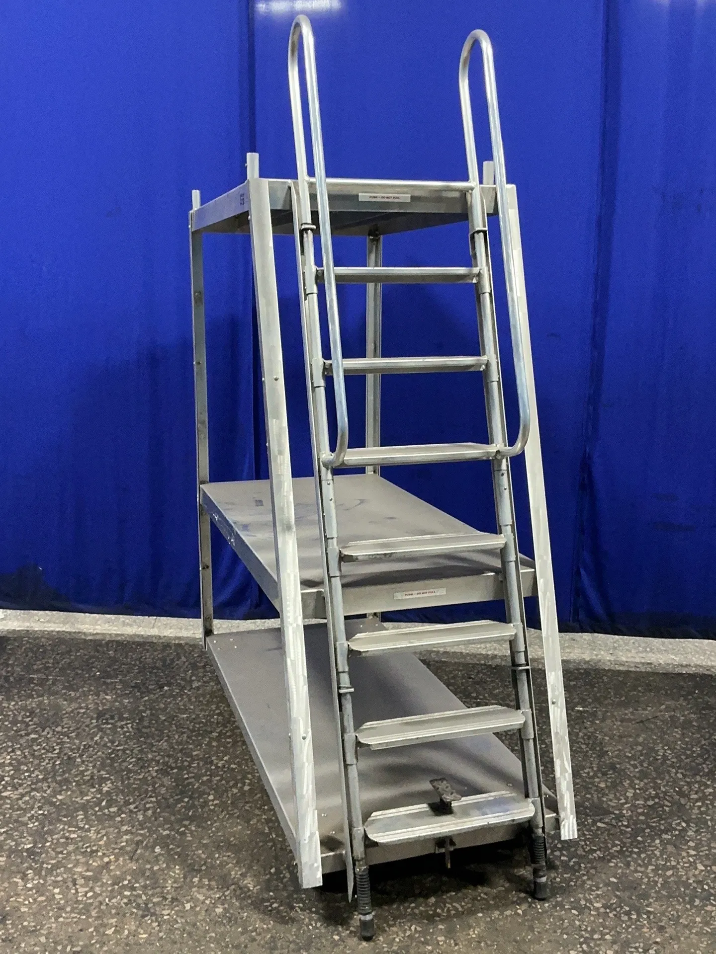 7 Step Rol-Away, platform ladder cart, 50" x 30" upper platform, 62" x 30" middle platform, 68" x 30" lower
