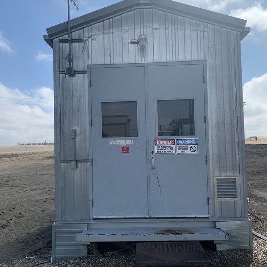Square D Canada, MCC, 600 Volts, 3 phase, w/ WEG 7.5 HP air compressor, skidded, housed, heated, damaged