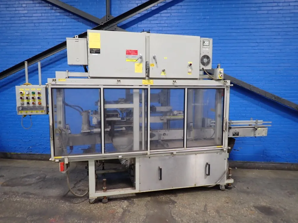 MTM #2035M-5, high-speed production spin trimmer, 40 A, 3 phase, 480 V.