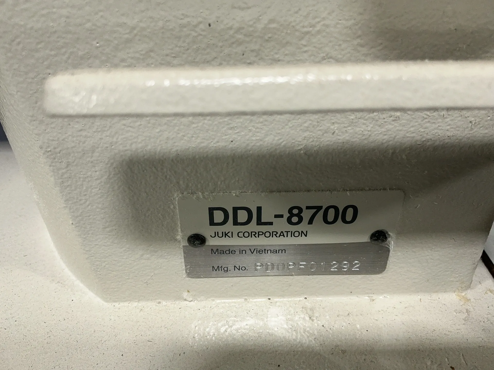 Juki #DDL-8700, sewing machine table, 21" x 47", foot switch, 550 width, 0-3450 RPM, 110 V. (2 available)