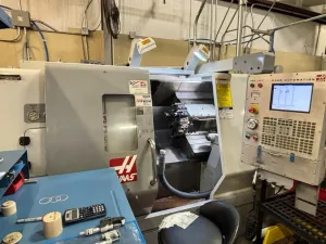 Haas #SL-20T, CNC Lathe, 23" swing, 8" chuck, 2" bar, 20" centers, 10.3" turning diameter, 4,000 RPM