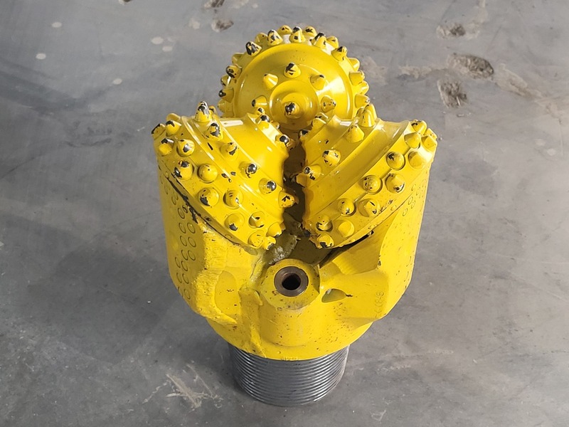 Atlas Copco #91001286, Tricone Rock Drill Bit, 10-5/8" bit diameter, 6-5/8" API pin, 121 carbide buttons, 2010