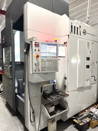 Haas #UMC-750, 5-Axis Universal Machining Center, 30" X, 20" Y, 20" Z, 19.7" table diameter, 24.8" max.
