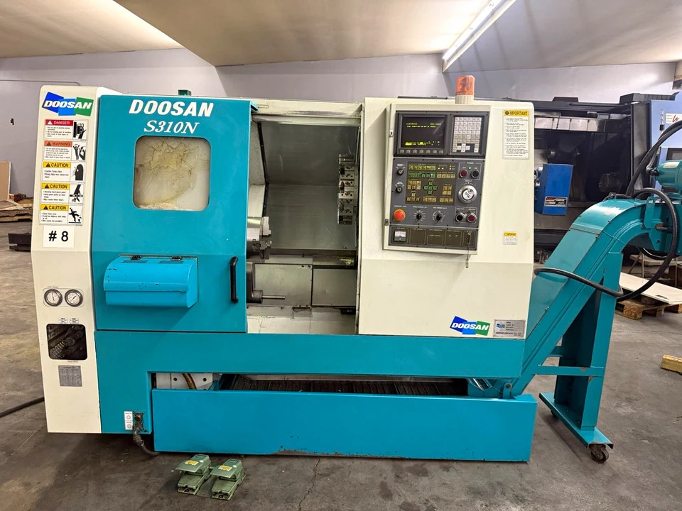 Daewoo Doosan #S310N, CNC Lathe, 20.4" swing, 24.2" centers, 12.2" turning diameter, 10" 3-jaw chuck, 2.6"