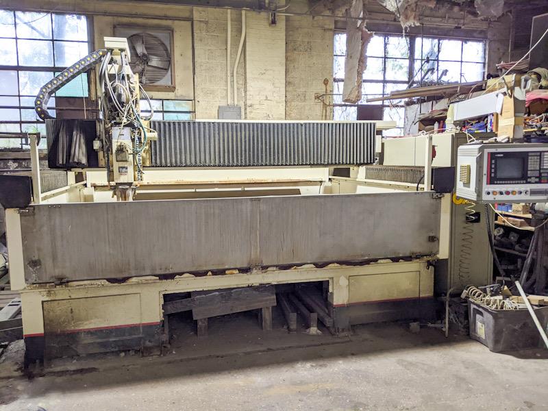 Omag #Logo-2000, CNC Work Center, 42.3" x 96" table, 6000 RPM, 20 HP, ISO 40, 12 ATC, NUM control, 2000, AS IS