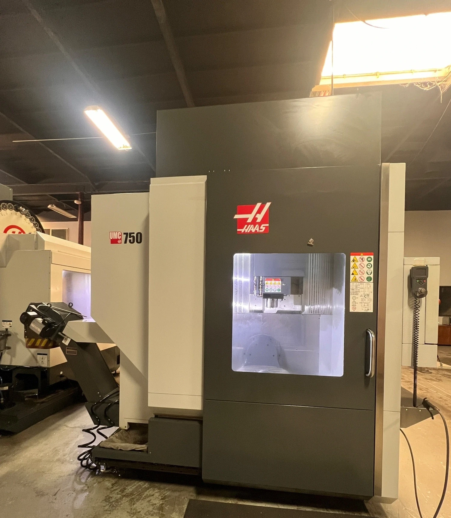 Haas #UMC-750, 5-Axis CNC Vertical Machining Center, 30" X, 22" Y, 20" Z, 19.7" x 24.8" table, 30 HP, 12,000