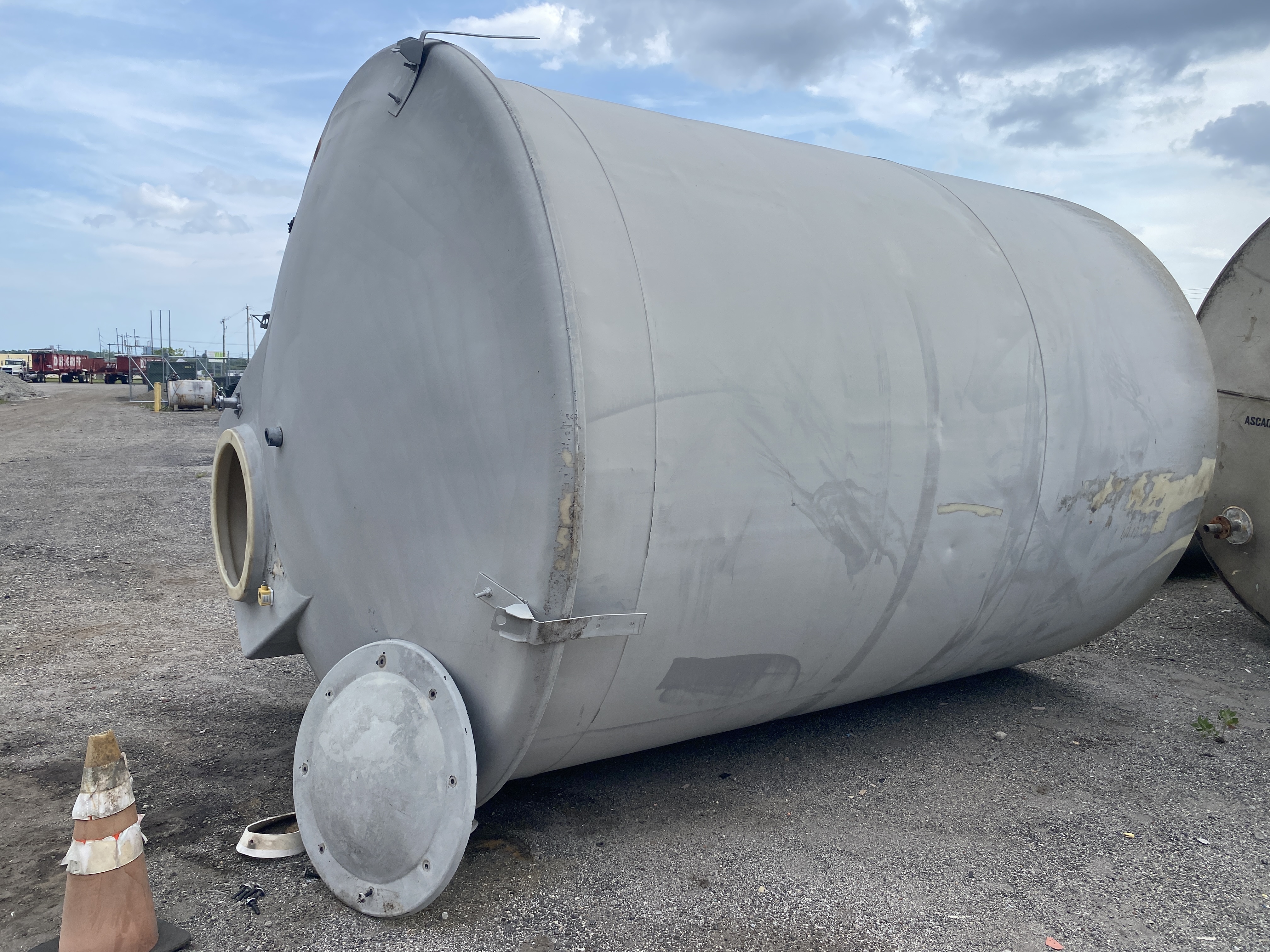 6800 gallon Poly Tank, 9' 6" diameter x 13' straight side, flat bottom, 27" manway, 2" side bottom drain