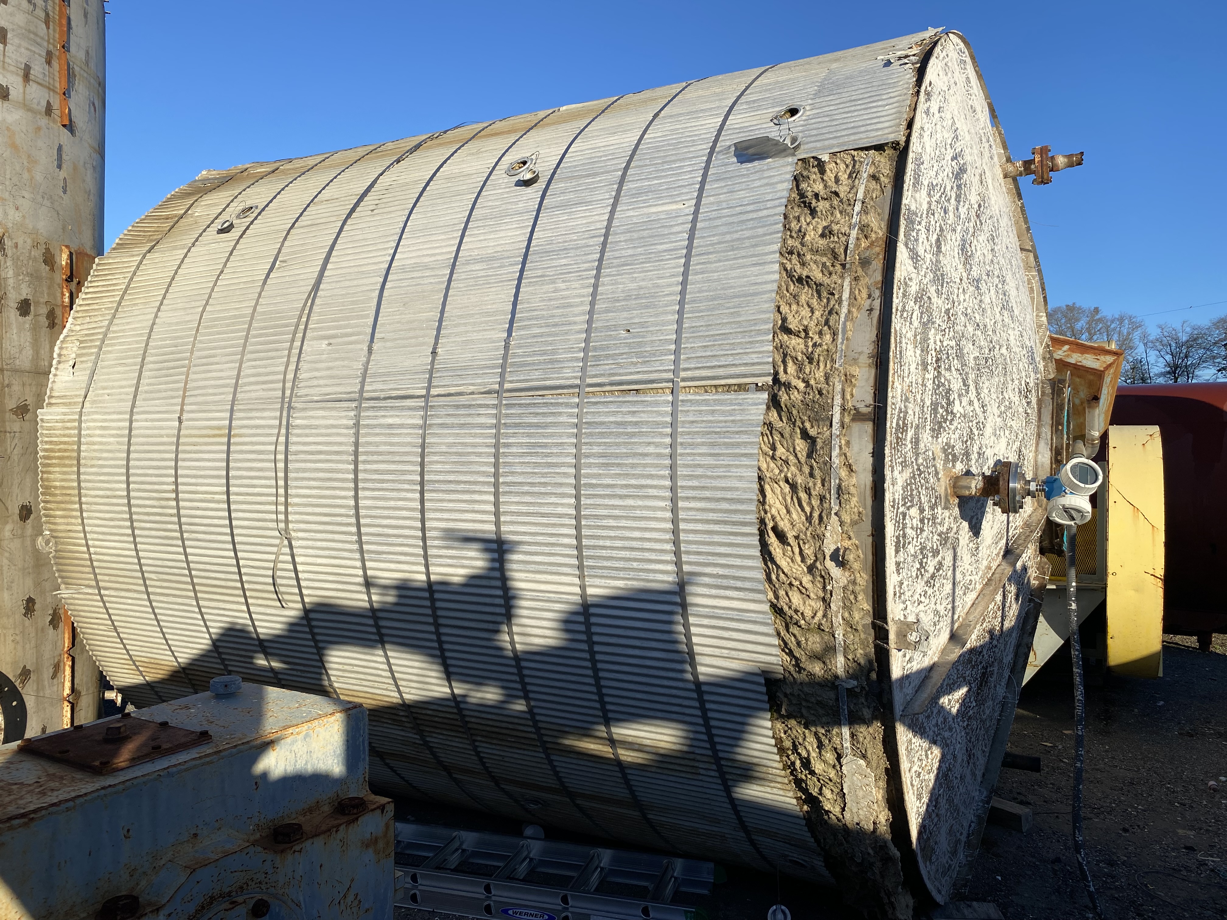 8500 gallon Stainless Steel Vertical Tank, 11' diameter x 12' straight side, dished top, flat bottom, 24"