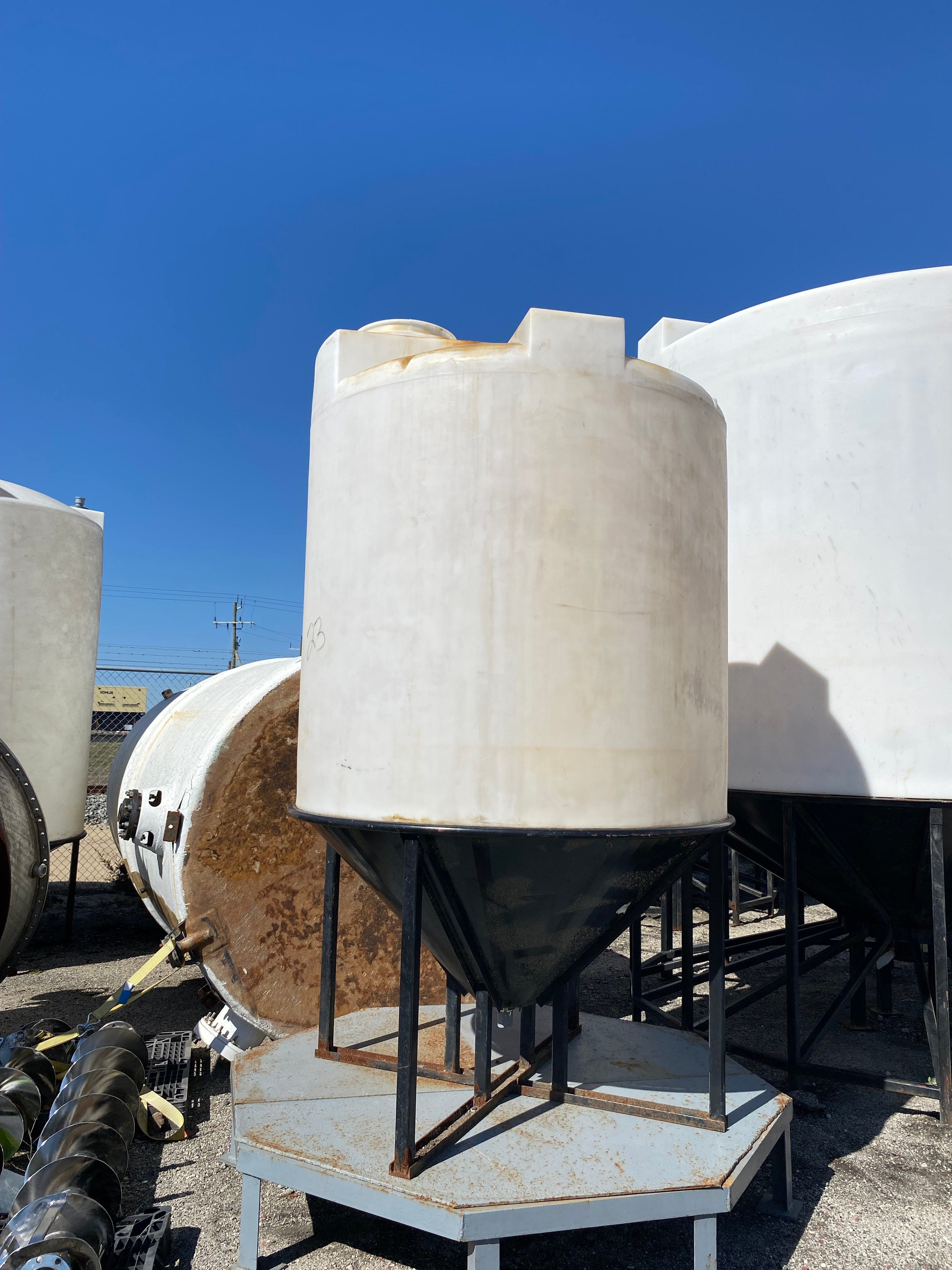1100 gallon Assmann #ICB-1100, Cone Bottom Poly Tank, 69" diameter x 60" straight side, 45° cone, 16"