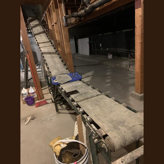 12" wide x 20' long Mathews, Inclined Conveyor, 2" diameter X 15" long rollers, additional 16" wide x 7.5'