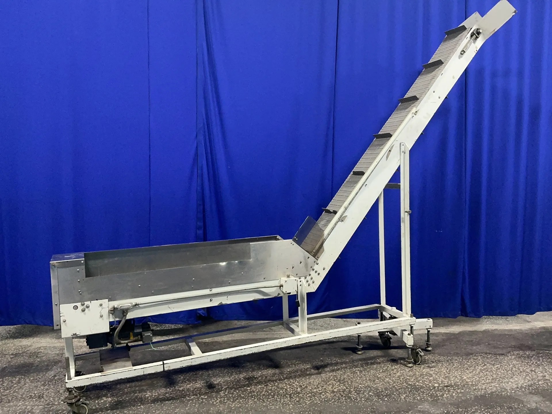 11" wide x 148" long, incline conveyor, 6' flat length, 85" chute rise, 12" flat height, 2" cleat height, .33