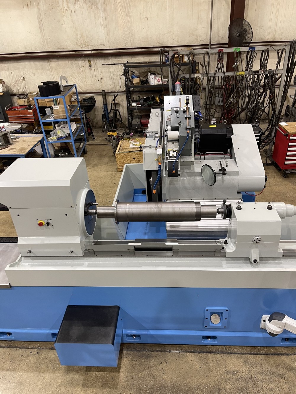 28" x 48" Abbott, roll grinder, 24" max. grind diameter, 36" x 2"-4" x 12" wheel, 0-1200 RPM, 6,500 lb.