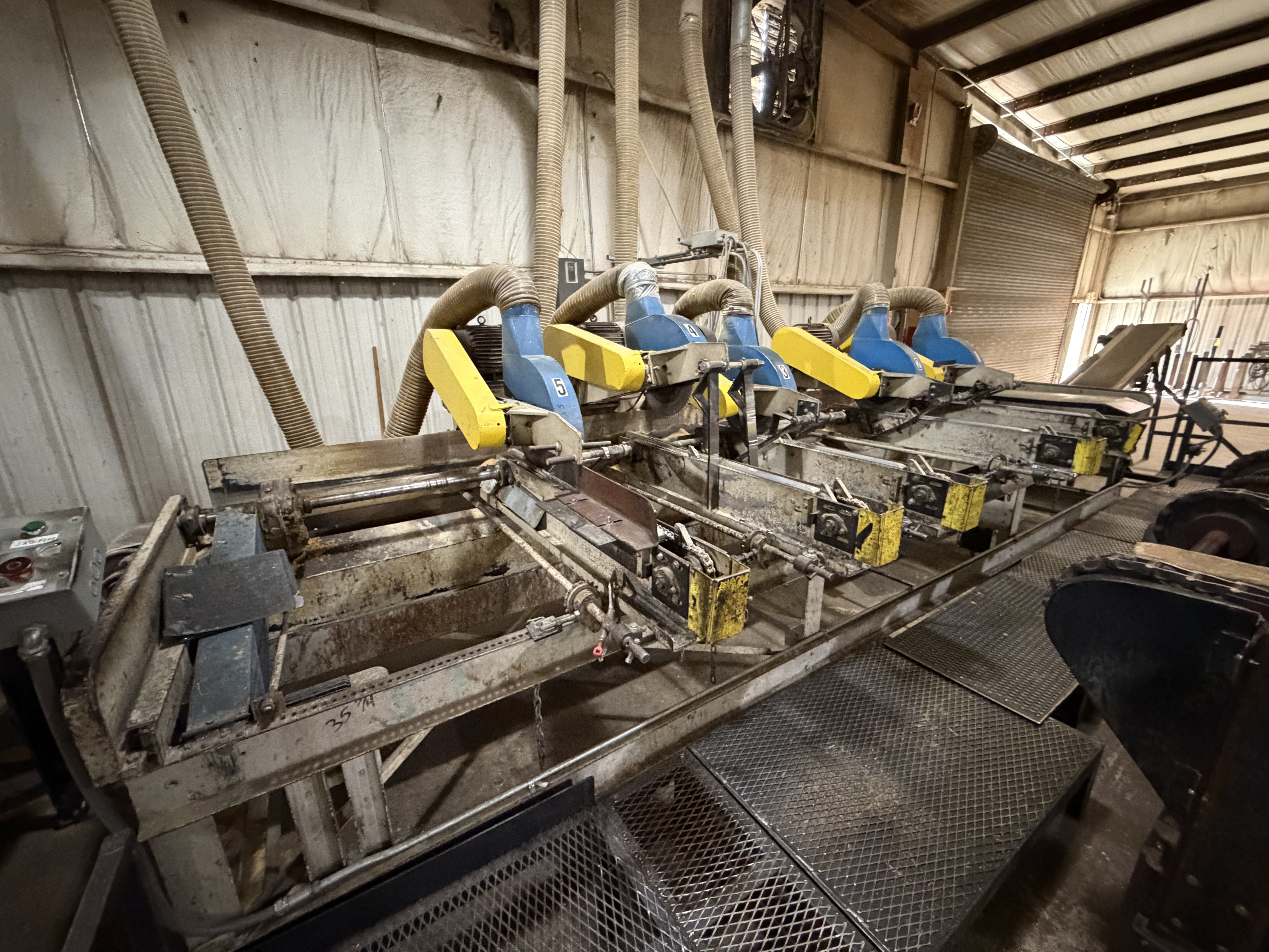 Newman #KM16, Multiple Head Trim Saw, 5-head, 16' L capacity, 4" thick, 7.5 HP motors, waste conveyor, parts