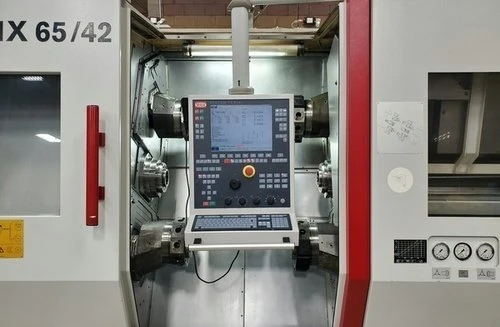Traub #TNX-65/42, 15-Axis CNC Lathe, 2.5" bar, 25.6" length, 8" chuck, 32.2 HP, 5000 RPM, (4) 10 station