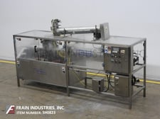 Orics #ACP-150, automatic, Stainless Steel, inline overlidder, rated from 20-150 lids per minute