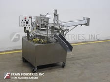 World Cup #12-32, automatic, 12 pocket rotary cup filler, sealer, lidder, 12 pocket 30" rotary turn table