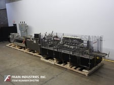 Triangle #HCS-E2-750, automatic, horizontal, continuous motion, hot melt glue cartoner