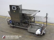 Stainless Steel auger & pump feeding system, 65" L x 32" W x 35" D hopper, AB PanelView Plus 700 touch screen