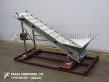 24" wide x 10.1' long, Hexcore, Stainless Steel inclined cleated feed conveyor, Stainless Steel hopper, 77"